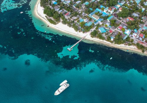 aerial-shot-ship-leaving-port-min